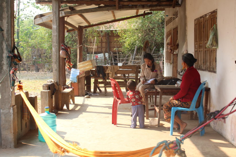 6 NPA interviews Mrs Khongsay w grandson w functional BLU 63 marked and secured in back Nongsakeung Village Saravane Province
