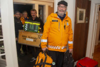 Frivillige fra Norsk Folkehjelp Nesset rykker inn med nødvendig utstyr for å bistå kommunen i evakueringen under ekstremværet Gyda.